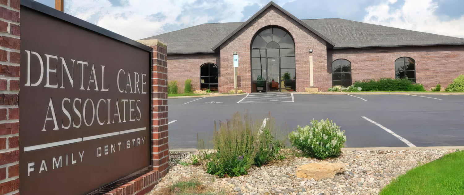 The front sign and front door of Dental Care Associates in Sioux Falls.